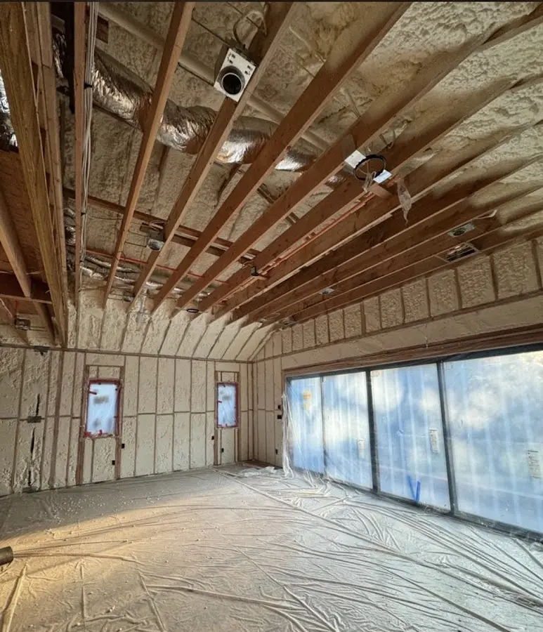 Interior walls and ceiling insulated with spray foam during new construction in Town 'n' Country